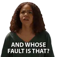 a woman with curly hair has a sticker on her face that says and whose fault is that