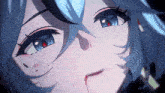 a close up of a person 's face with blood coming out of their mouth