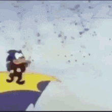 a cartoon character is standing in the snow with a yellow sign that says ' sonic the hedgehog ' on it