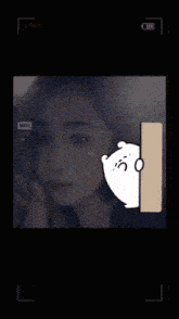 a woman 's face is shown next to a bear with hearts coming out of it