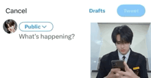 a man in a suit and tie is looking at his phone while someone says " what 's happening "
