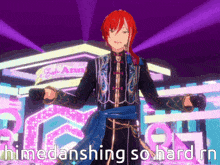 a man with red hair is dancing in front of a sign that says 8th anni