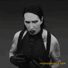 a black and white photo of marilyn manson with a reviewonivere.com watermark