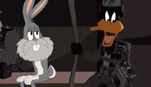 bugs bunny and daffy duck are standing next to each other .