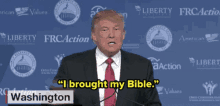 donald trump says " i brought my bible " while speaking at a podium