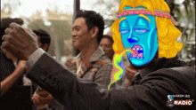 a man in a suit has a cartoon face on his face and the words radio on the bottom