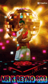 a man is standing in front of a disco ball with the name mr.k. reyno 303
