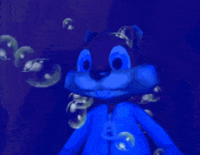 a blue cartoon character with bubbles around his head says excellent