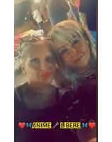 two women are posing for a picture with the words anime libere written on the bottom