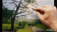 a person is painting a tree with a brush and the words made in animotica are visible
