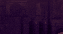 a man with a backpack is walking down a dark alleyway