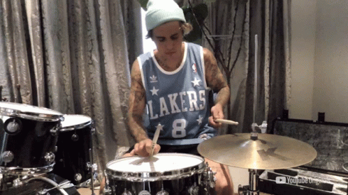 justin bieber as a child playing drums