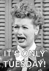 a black and white photo of a woman screaming with the caption it 's only tuesday !