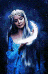 a woman in a blue dress holding a crescent moon