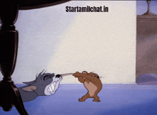 a cartoon of tom and jerry with the website starttamilchat.in visible