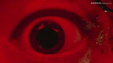 a red background with the words arrow presents at the bottom