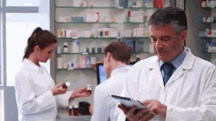 Working In A Pharmacy GIF - Working Pharmacy Smile GIFs
