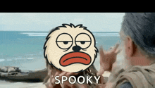 a cartoon character says spooky in front of a couple