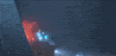 a robot with a yellow light on its head is shooting a red beam