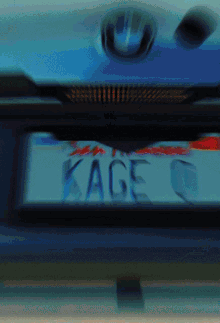 a blurry image of a license plate that says kage on it
