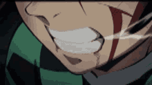 a close up of a person 's mouth with blood coming out of it and a sword in it .