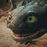 a close up of a dragon 's face with its mouth wide open