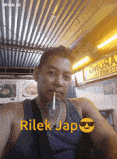 a man smoking a cigarette in front of a sign that says ' wink ai '