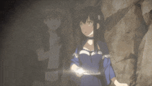a boy and a girl are standing next to each other in a dark cave