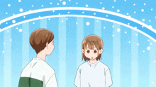 a boy and a girl are standing next to each other