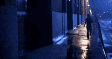 a blurry picture of a person walking down a hallway at night .