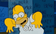 homer simpson is standing in front of a wall that says no beer