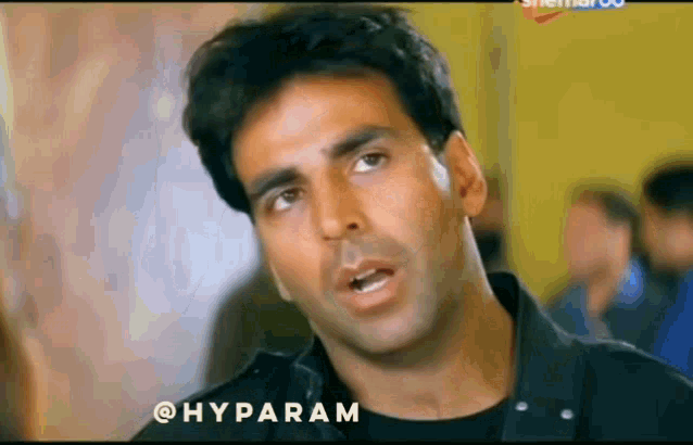 a close up of a man 's face with the word hyparam written on it .