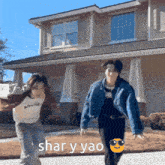 a couple of people standing in front of a house with the words shar y yao on the bottom