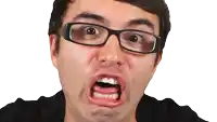 a man with glasses making a funny face with his mouth open