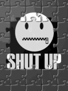 a puzzle with a smiley face and the words shut up written on it