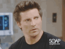 a close up of a man 's face with soapnet.com in the upper right corner