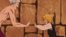 a man without a shirt is standing next to a girl