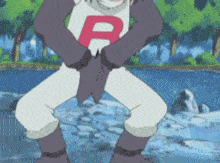 a cartoon character with a letter r on his shirt is standing in front of a body of water .