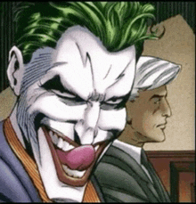 the joker is smiling with his tongue sticking out