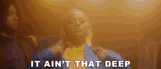 a woman in a blue jacket with the words 