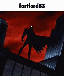 a cartoon batman is standing on top of a building .