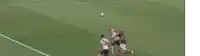 a soccer game is being played in front of a banner that says " evolution es conmebol "