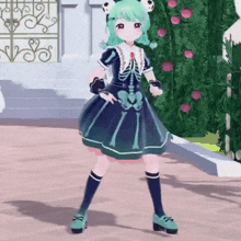 a girl with green hair and a skeleton dress is dancing in front of a christmas tree .