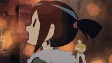 a girl in a ponytail is standing next to a man in a yellow shirt .