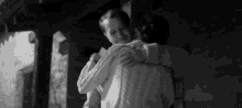Mank Gary Oldman GIF - Mank Gary Oldman Hugging GIFs