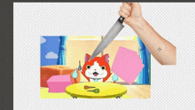 a hand is holding a knife over a cartoon cat