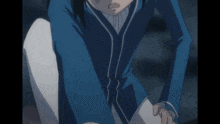 a person in a blue jacket and white pants