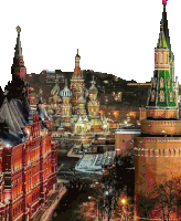 a tower with a red star on top of it is surrounded by other buildings