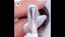 a close up of a person 's nails with a brush .
