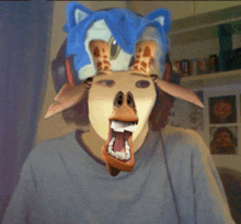a giraffe wearing a sonic the hedgehog mask